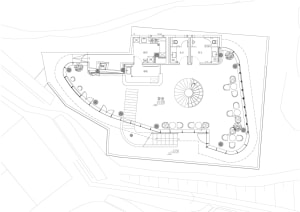 2D floor plan of a modern open-plan space with dining and kitchen areas, featuring linework, labels, and measurements