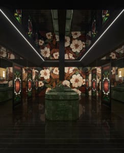 Ornate bathroom with a large stone sink and floral patterned walls, dimly lit for a cozy atmosphere