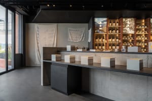 A well-organized retail space with wine bottles and bowls on display, inviting customers to explore the store