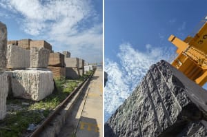 A mountainous landscape with a rocky cliff face and a modern stone wall, blending natural and man-made elements