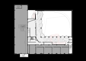2D floor plan of a dental office with multiple chairs arranged throughout the space, displayed on a black background