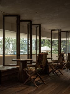 A cozy dining space with a table and three chairs, designed for socializing and enjoying meals together
