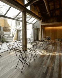 A warm and inviting dining space with multiple chairs and tables, perfect for family meals