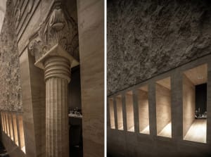 Elegant interior space with stone columns and pillars, stone walls, and a sophisticated atmosphere
