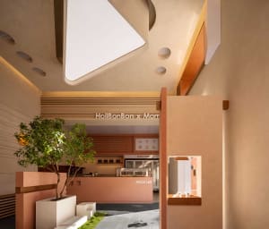 A bright and inviting open space with a high ceiling, skylight, concrete walls, and modern furniture, including benches and potted plants