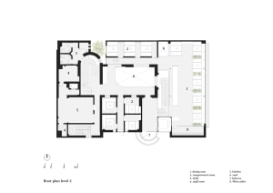 2D floor plan of a modern hotel or residential complex with various rooms and spaces, including a lobby, hallway, and multiple bedrooms