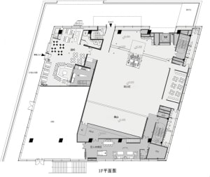 Modern open-plan living space with multiple rooms, chairs, and a functional layout