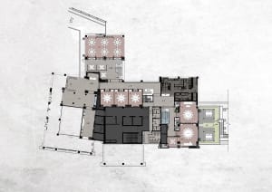 Detailed floor plan of a mixed-style building with various rooms and spaces, well-lit with natural light through windows and skylights