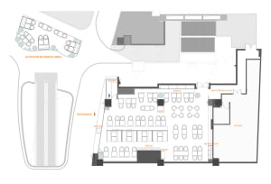 Black and white floor plan of a commercial building with dining and kitchen areas, well-organized and designed for efficient use of space