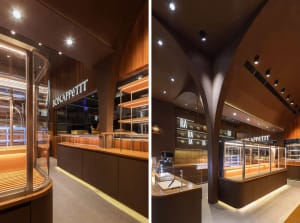 A restaurant interior with wooden elements, warm atmosphere, and customers enjoying their meals, exterior shot shows a well-lit entrance