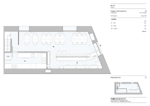 Modern commercial dining space with multiple tables, chairs, and sinks, designed for ample seating and workspace