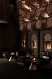 Cozy restaurant interior with wooden walls and tables, comfortable seating, and inviting atmosphere