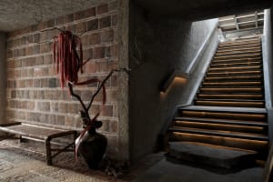 A multi-level staircase with stone steps and a sense of depth and complexity within the structure