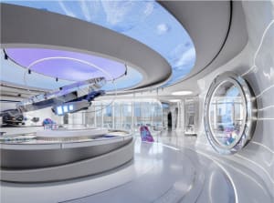 A modern building with a large circular atrium featuring unique spaceship-inspired design, adorned with artworks and well-lit by natural and artificial light