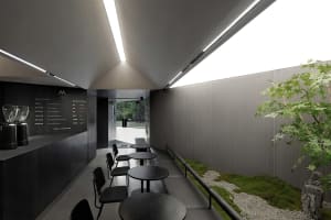 Inviting restaurant interior with multiple tables and chairs, well-lit by natural light from windows