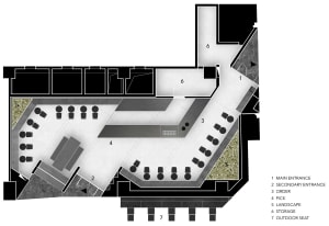 2D floor plan of a modern restaurant with a large dining area featuring multiple tables and benches, with linework and labels indicating measurements and layout