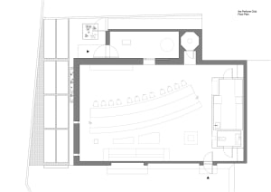 A 2D floor plan of a modern hotel with multiple rooms and areas for relaxation and socializing, featuring chairs and a well-designed layout