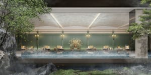 A large indoor pool surrounded by chairs and vases, creating a relaxing atmosphere for leisure activities