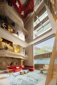 Cozy modern living area with a red couch, chairs, and a dining table near a window, creating a warm and inviting atmosphere