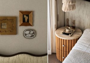 A well-lit bedroom with wall decor, a wooden dresser, and a fish plate, creating a comfortable atmosphere