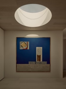 A minimalist room with a large piece of modern art on the wall, featuring a white color scheme