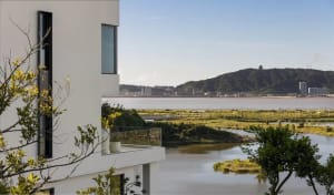 Waterfront House with White Exterior