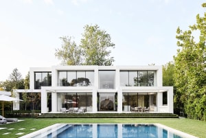 Modern White House with Glass and Concrete Elements