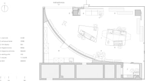 2D floor plan of a modern room with a circular shape, featuring a mail area and kitchen, with linework, labels, and measurements