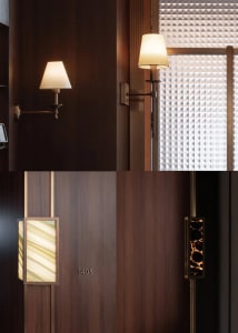 A dimly lit hallway with a brown door, wall, and floor, with a doorway leading to another room