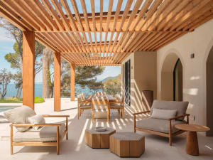 A modern outdoor living area with a wooden deck and patio, featuring a dining table, chairs, couch, and bench, surrounded by a potted plant, creating a comfortable and inviting atmosphere with a natural and warm ambiance