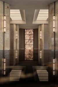 Elegant hotel lobby with marble flooring, well-lit and sophisticated design
