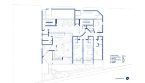 Detailed modern building floor plan with rooms, hallways, and natural light from windows
