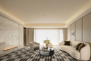 A modern living room with a couch, chair, and coffee table, featuring a large window and white furniture, with natural light filling the space