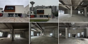 A modern building with a mix of concrete and glass elements, featuring a combination of open and enclosed areas with a focus on interior design