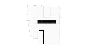 Black and white 2D architectural floor plan of a modern residential apartment showing living room, kitchen, bedrooms and bathrooms