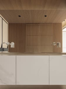 Modern minimalist bathroom vanity with white marble countertop and cabinetry, set against a vertical wood slat accent wall and matching slatted ceiling with recessed lighting.