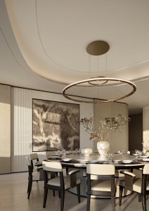 Modern luxury dining room featuring a large round marble table, dark wood and cream dining chairs, a contemporary circular chandelier, and a large Chinese ink wash painting of misty mountains.