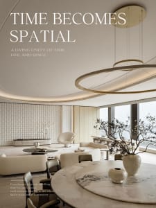 Modern luxury living and dining area featuring a large white marble round table, curved cream sofas, textured accent wall, and a dramatic circular pendant light fixture.