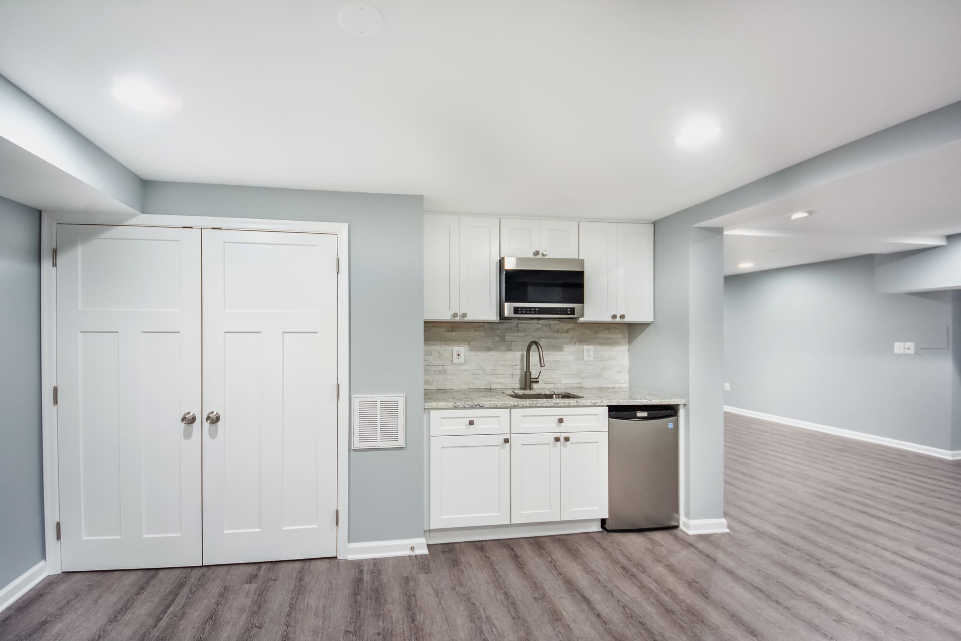 Finished Seattle basement family room with clean lines and durable finishes.