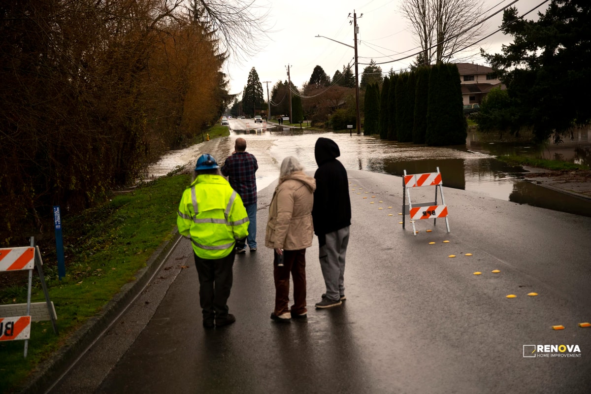Flooded commercial and residential structures near river floodplain