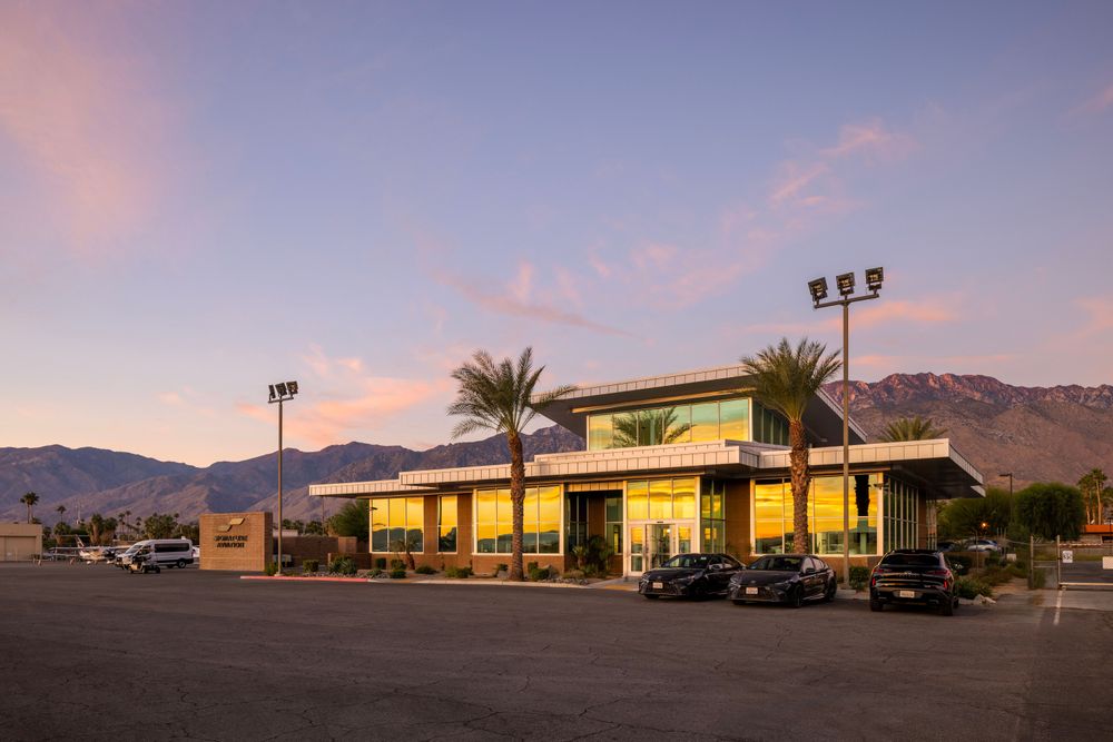 Signature FBO at PSP, external with palm trees