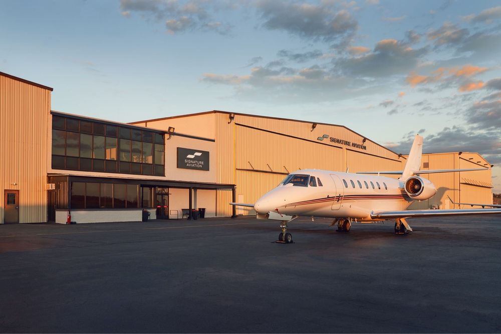 Signature FBO at Trenton Mercer Airport tarmac with aircraft