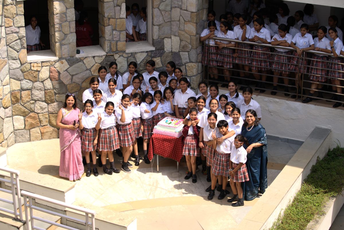 Cake cutting with Principal Mam