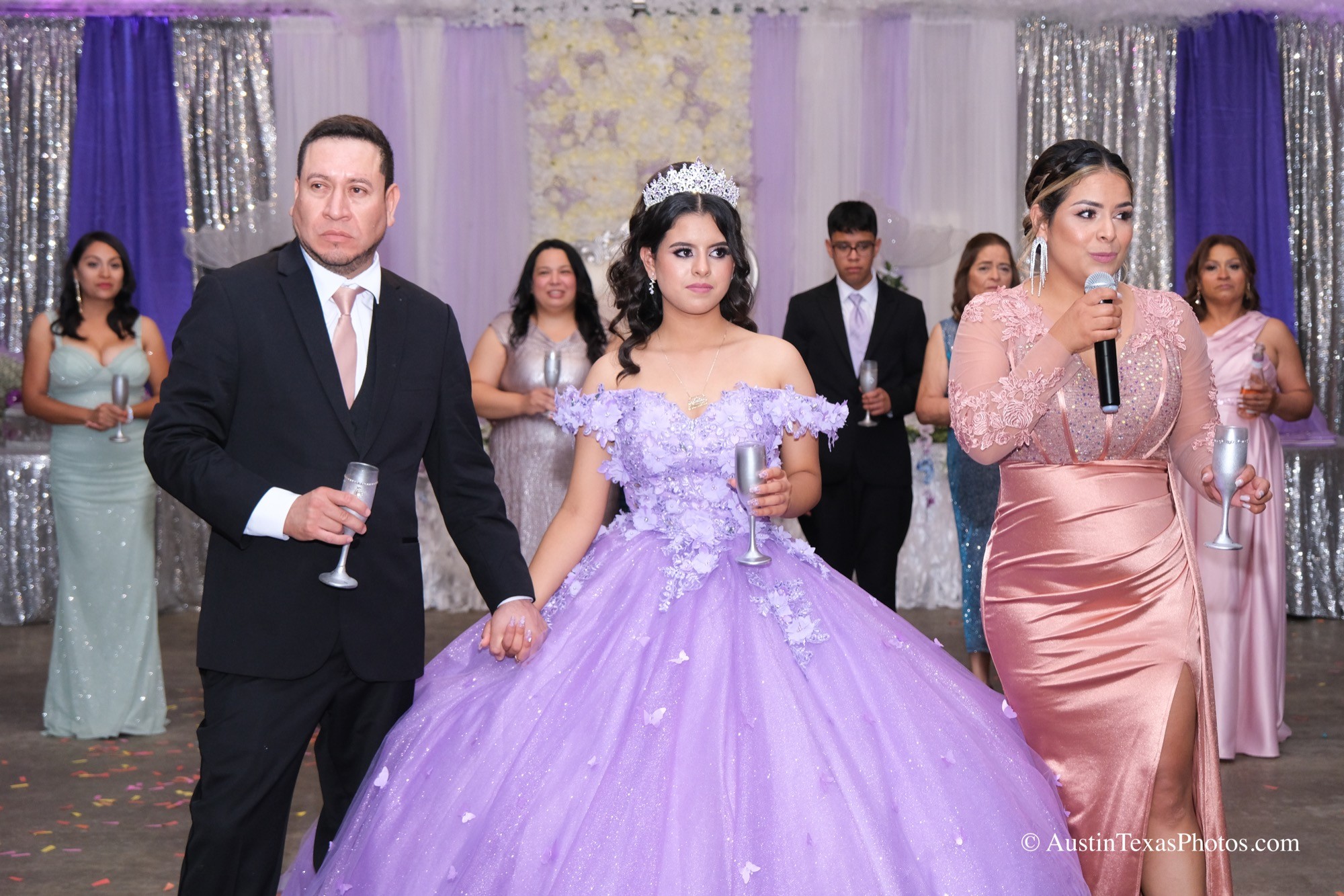Mother giving a toast at the quinceañera reception