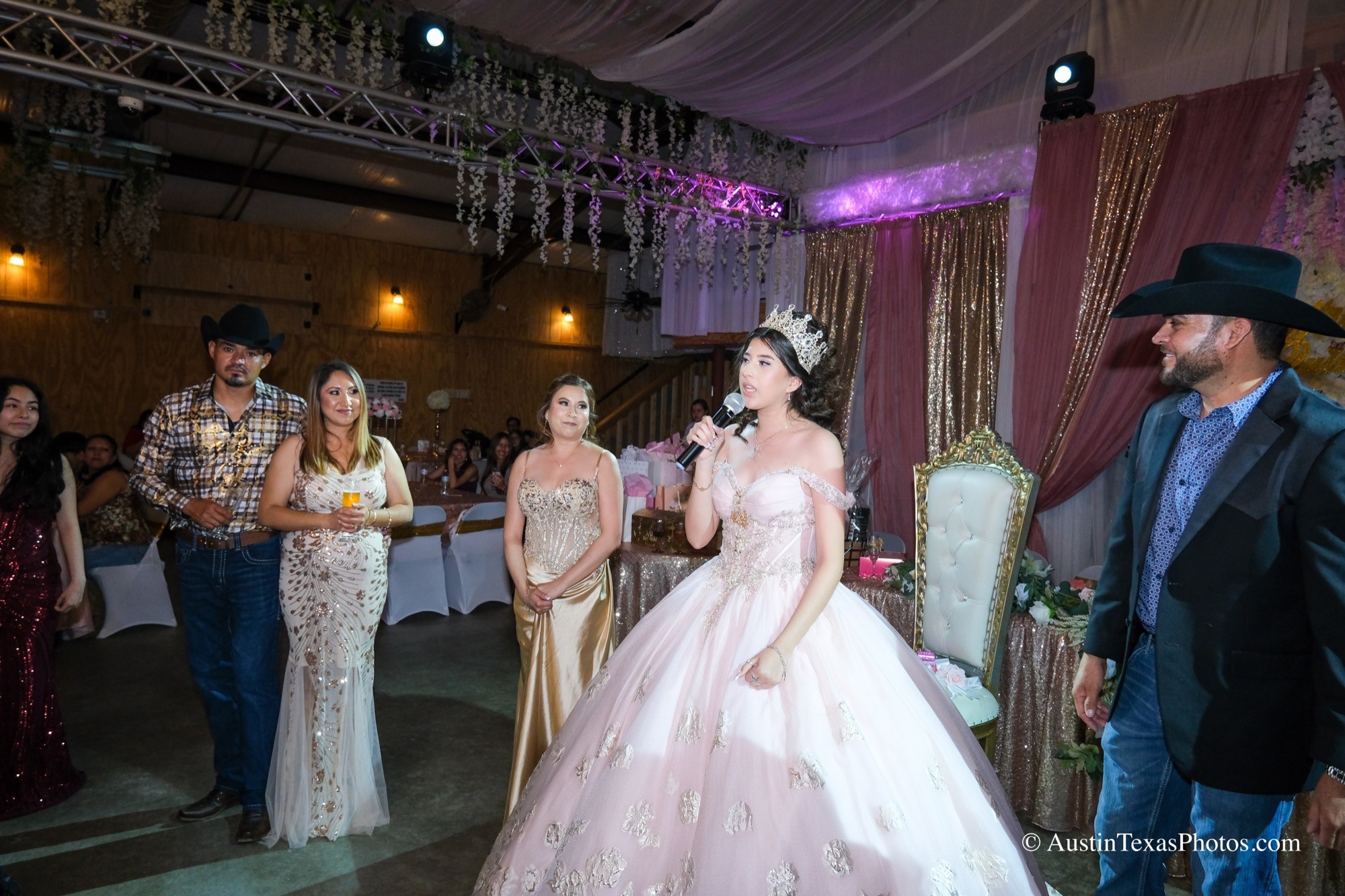 Quinceañera cake cutting at reception
