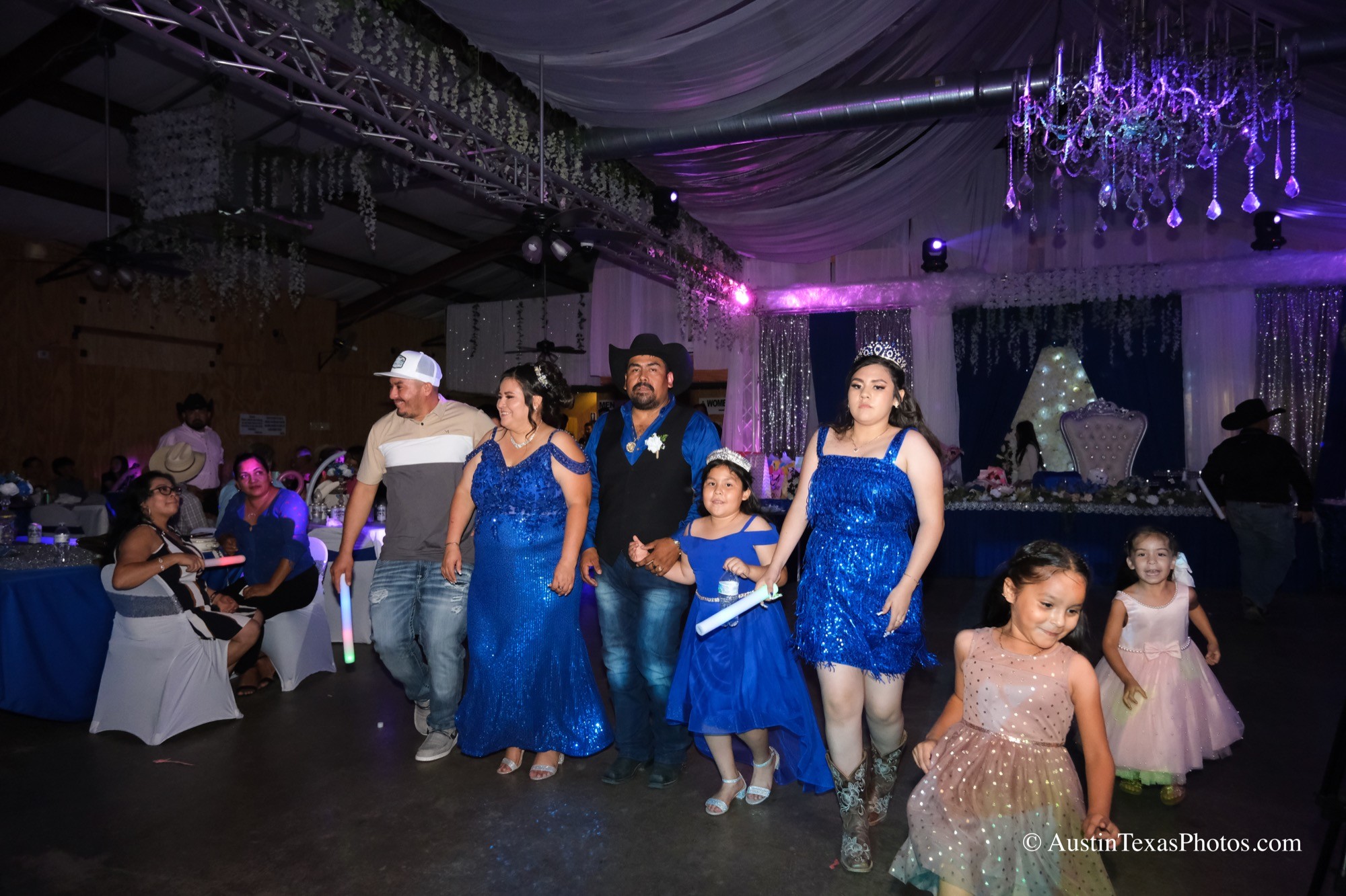 Candid celebration moment at quinceañera reception