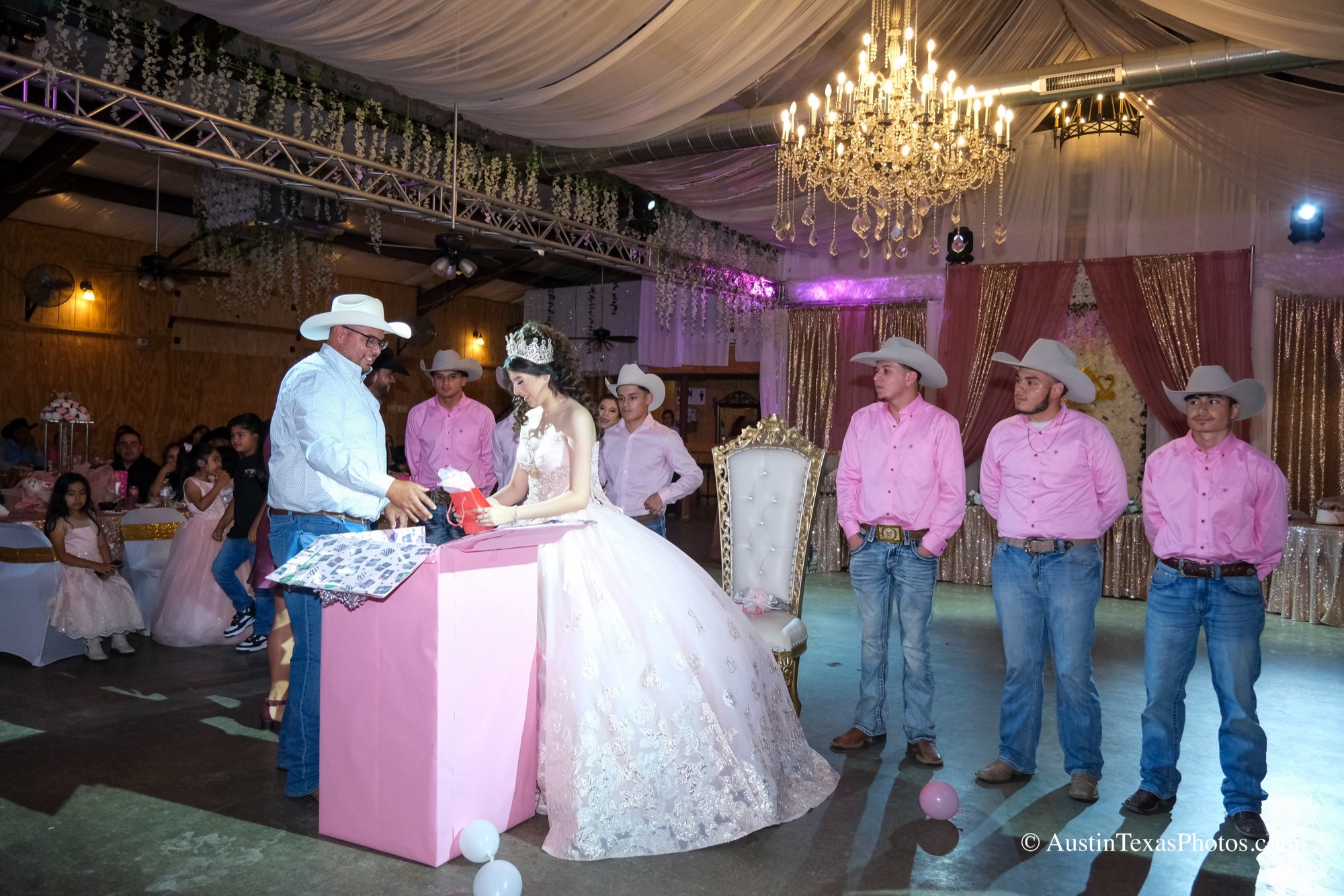 Quinceañera opening gifts at reception