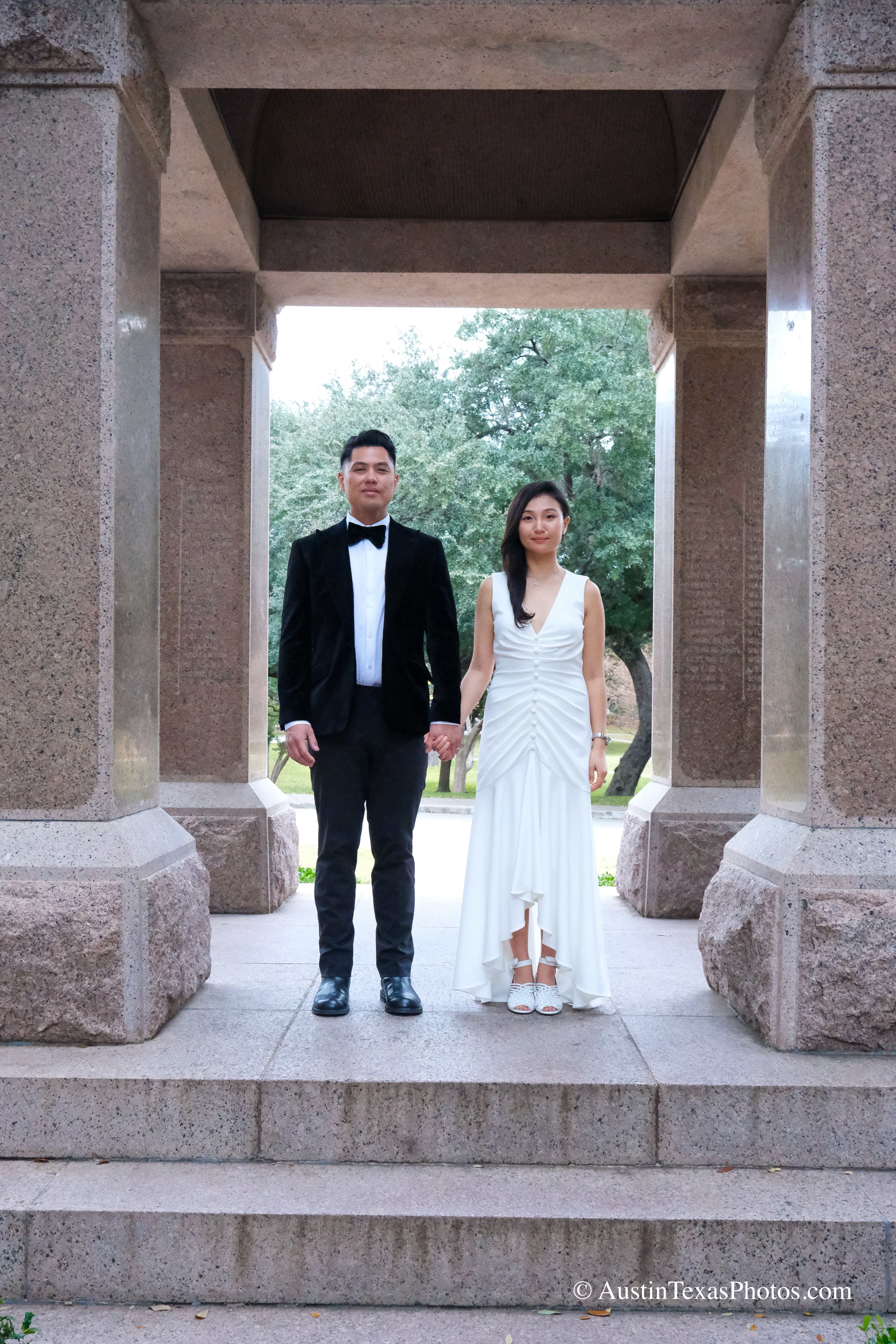 Bride and groom holding hands at the Texas State Capitol, Austin, Texas