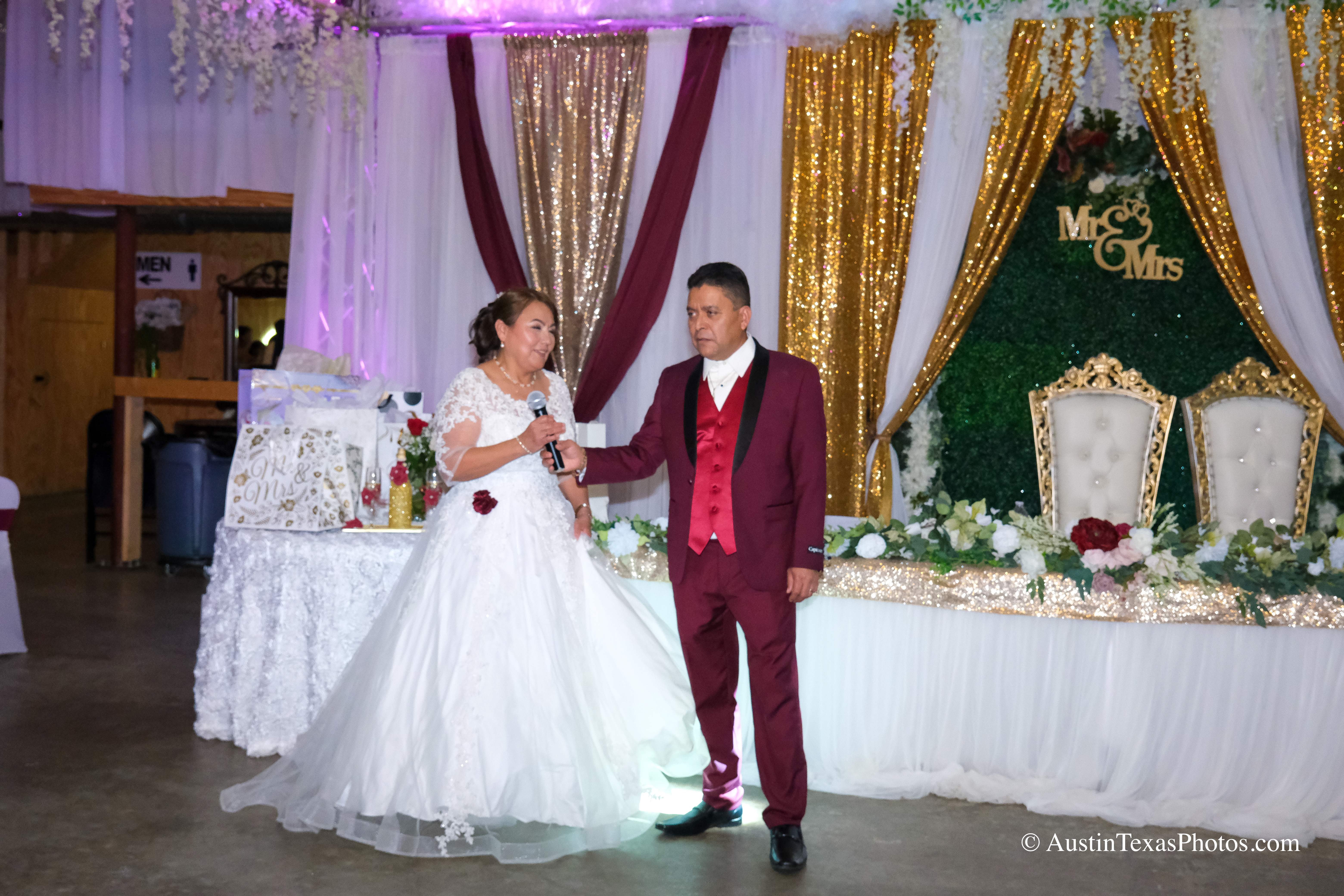 Bride giving emotional toast speech at wedding reception