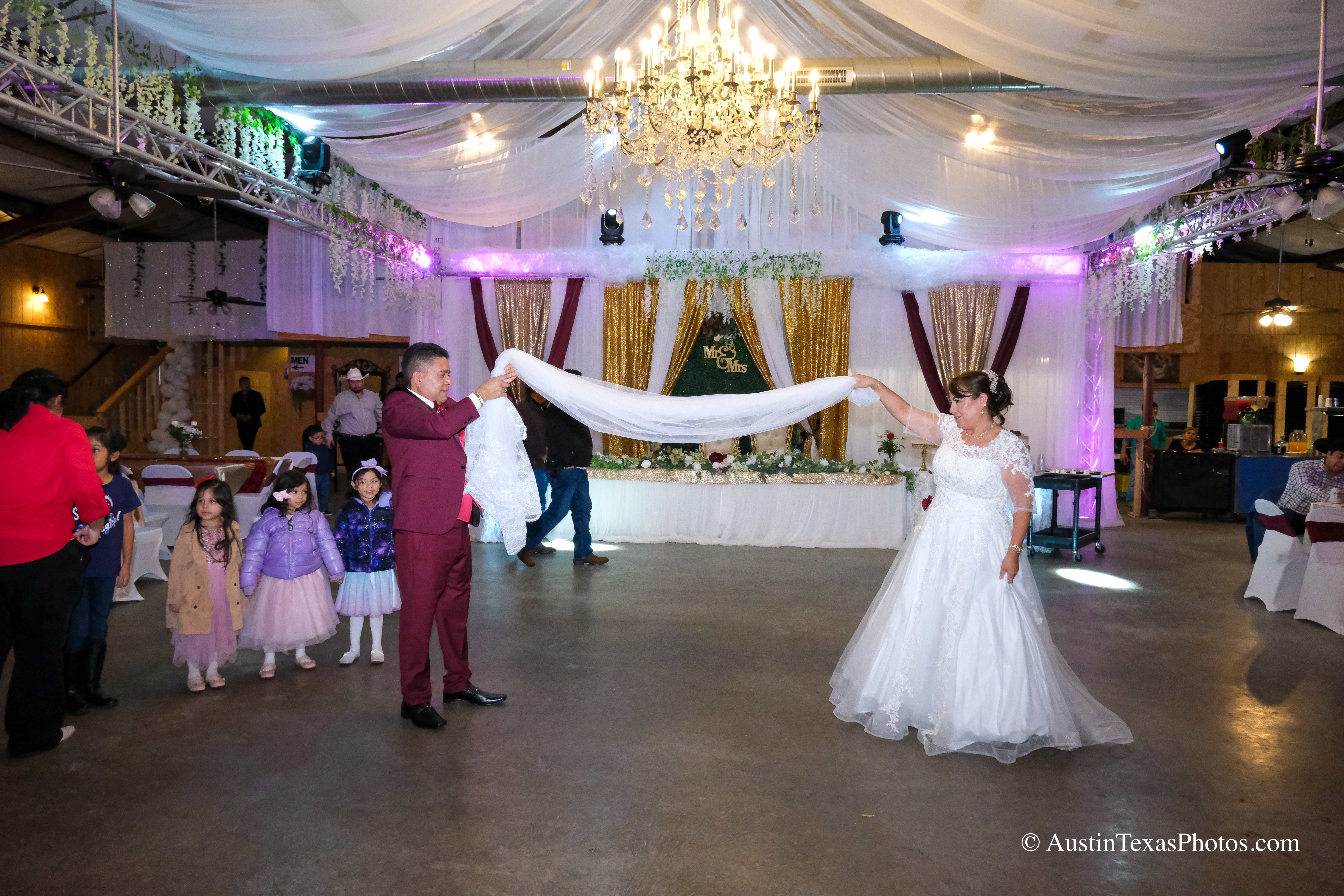 Traditional veil dance at wedding reception celebration